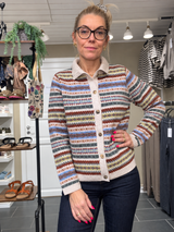 Faulkner Cardigan Light Oat fra Mansted i merinould