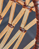 House Doctor HDFlow loungestol i natur rattan med sort jernstel