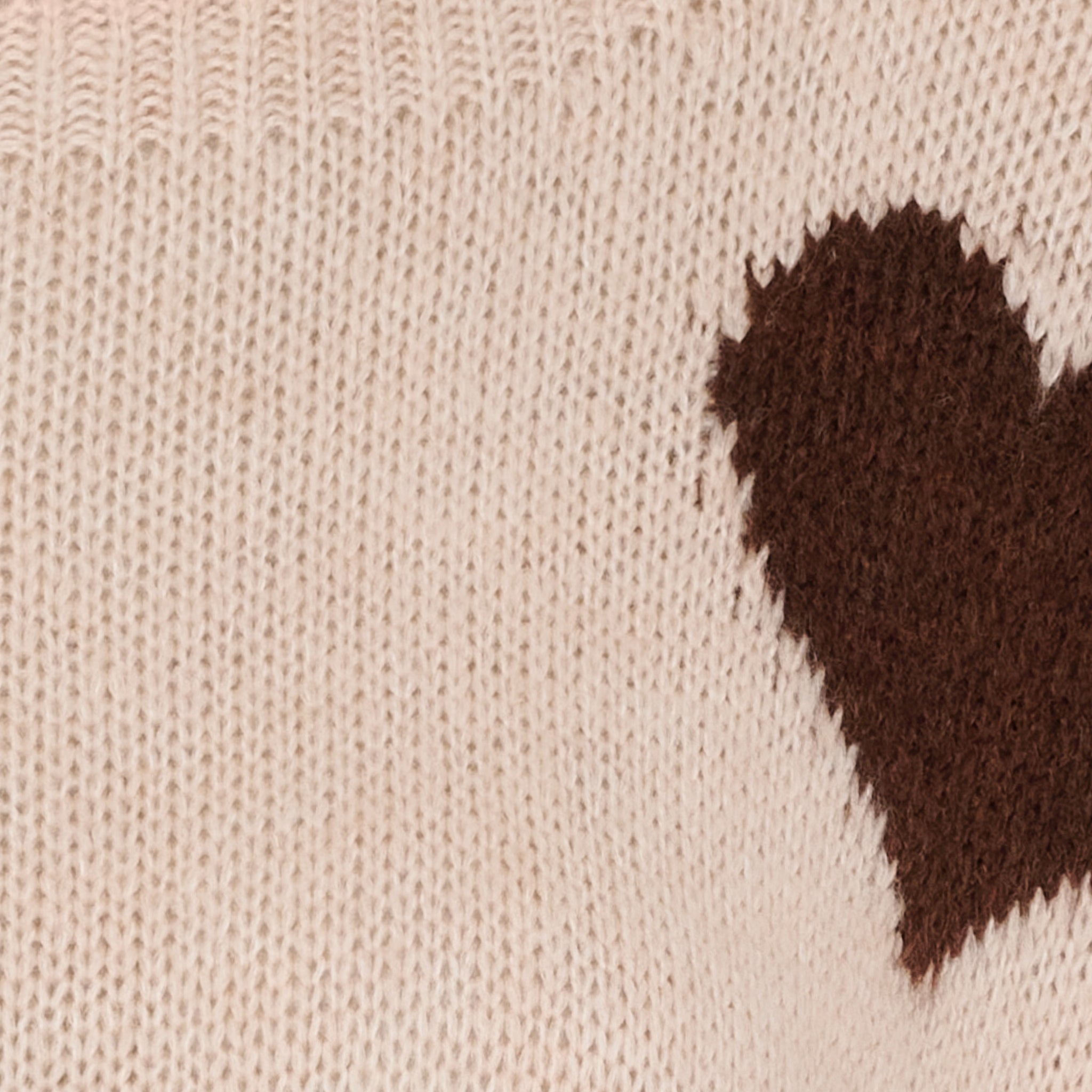 Detalje – hjertemotiver på Amarante Knit 64023