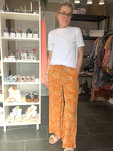 Unikke orange silkebukser i genanvendt silke