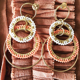 Maq Jewelry store øreringe med forgyldte ringe og koral perler