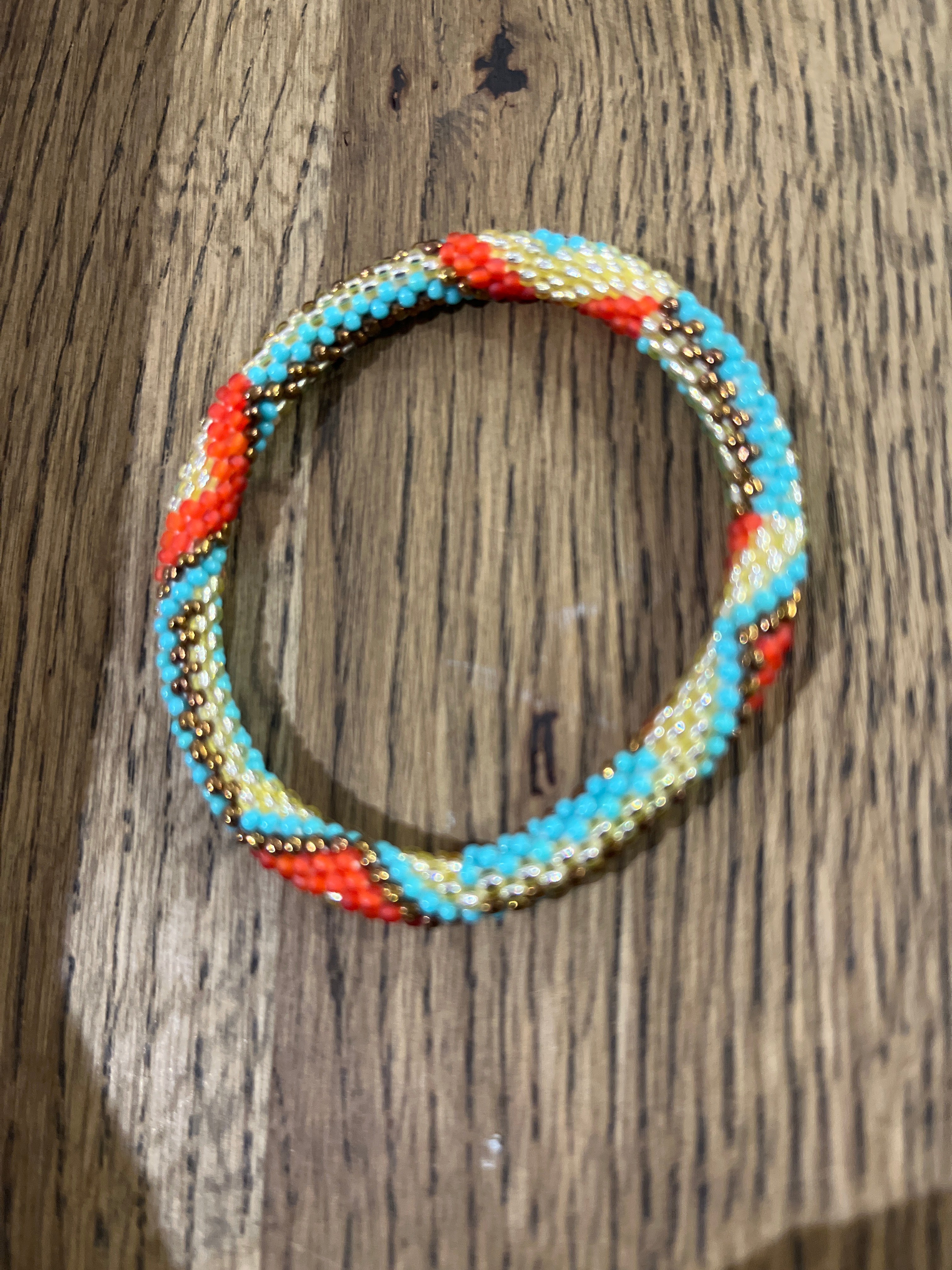 Le Mosch Nepal armbånd – turkis/orange, håndlavet roll-on i glasperler
