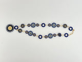 Forgyldt halskæde fra Maq Jewelry med marineblå og turkise perler