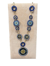 Forgyldt halskæde fra Maq Jewelry med marineblå og turkise perler